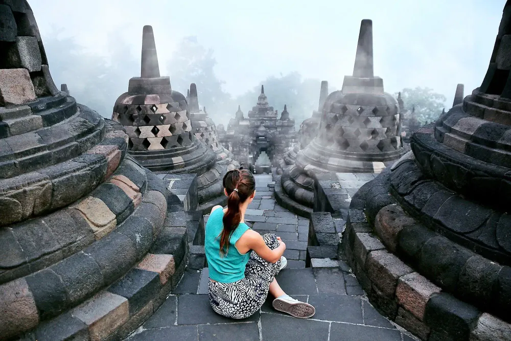 gap year travel woman at archaeological site